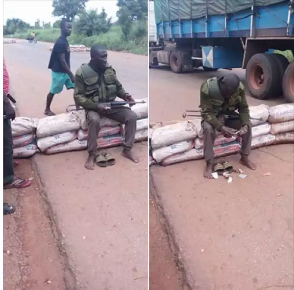 Photos: Drunk Policeman Allegedly Threatens Road Users With Gun In Benue State